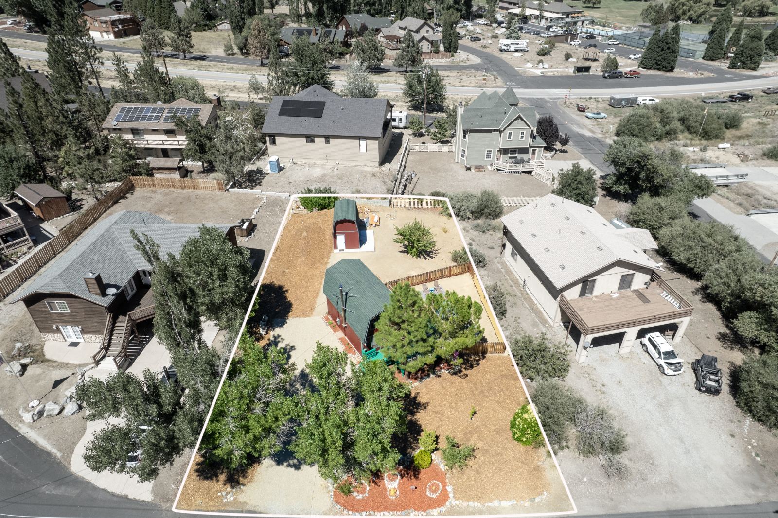 Aerial of a village lot with its property lines drawn in